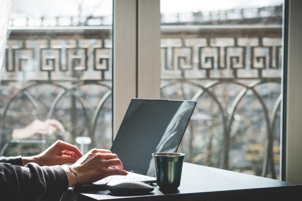 Image of a person using a Macbook at PAAC IT in the checklist for businesses article